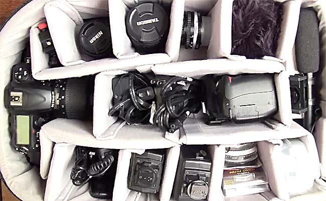 photographic camera equipment inside a Calument BP 1500 camera backpack