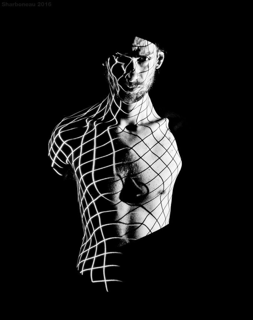 projection photography male model black and white grid